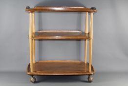 An Ercol Light Oak Tea Trolley
