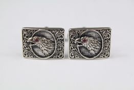 A Pair of Silver Cuff Links