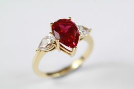 A 14ct Yellow Synthetic Ruby and CZ Ring