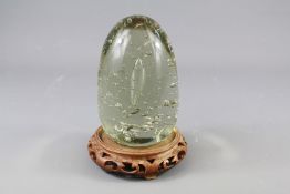 A Victorian Clear Glass Dumper Weight