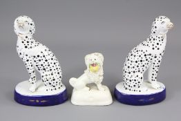 A Pair of 19th Century Staffordshire Porcelain Dogs