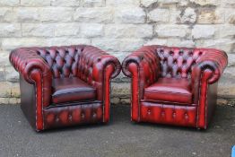 A Pair of Claret Leather Button Back Club Chairs