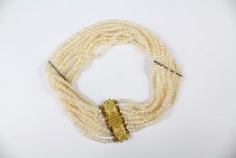 An Antique Continental Nine Strand Fresh Water Pearl Choker