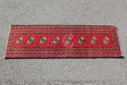 A Torkaman Red/Blue Runner