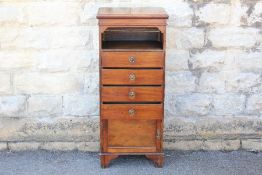 An Edwardian Mahogany Music Cabinet