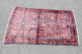 A Hamedan Red/Blue Carpet