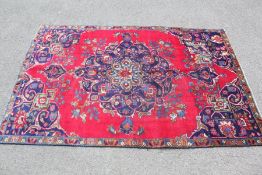 An Antique Zanjan Red/Blue Carpet