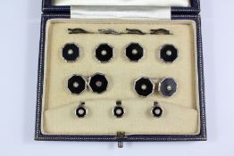 A Set of Gentleman's 9ct White Gold Onyx and Pearl Dress Studs