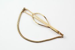 A Gentleman's 9ct Gold Tie Slide