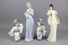 Four Porcelain Figurines