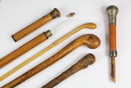 A Silver Topped Parasol Handle