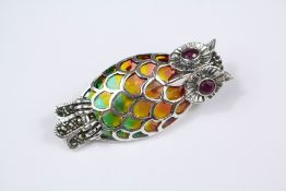 A Silver and Plique du Jour Owl Brooch