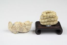 A Chinese Ivory Carving of a Coiled Serpent