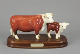 A Beswick Hereford Cow and Calf Figurine