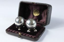 A Pair of Victorian Silver Cruet Peppers