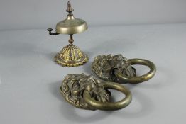 A Pair of Brass Lion Mask Door Knockers