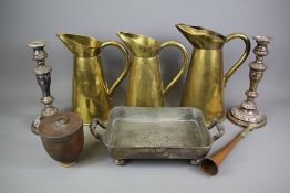 Three Graduated Brass Cider Jugs