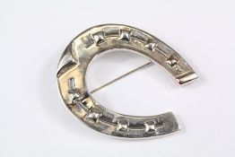 A Silver Horseshoe Brooch