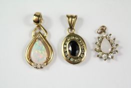 Three 9ct Gold Pendants