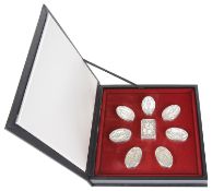 Eight Franklin Mint 'The Guards Regiments' sterling silver boxes, in a fitted case