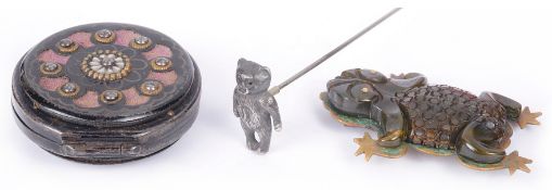 An unusual Bakelite frog brooch and others