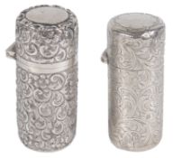 A Victorian embossed silver perfume bottle and another silver perfume bottle