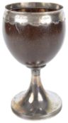 A George III mounted coconut cup