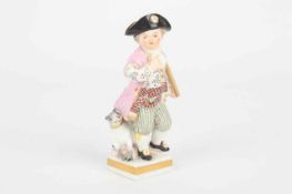 A 19th century Meissen porcelain figure of a young boy