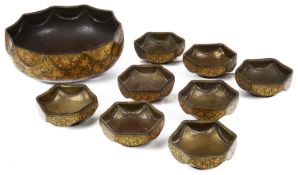 A suite of Kashmir papier mache and metal lined bowls