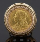 A Victorian fine gold sovereign, 1894 in heavy gold ring mount