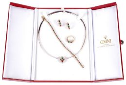 An attractive suite of contemporary Continental diamond, emerald, sapphire and ruby set jewellery