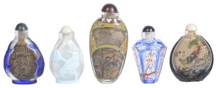 Five 20th century Chinese glass snuff bottles