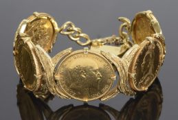 An 18ct gold bracelet formed of five articulated sovereign panels