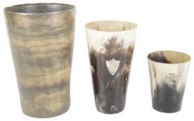 A Victorian silver mounted horn beaker and two others