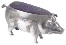 An Edwardian silver novelty pin cushion in the form of a pig, hallmarked Birmingham 1905