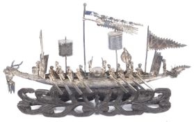 A Chinese Cumow silver model of a dragon boat in original postage bag, mid 19th century