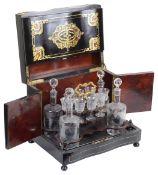 A late Victorian tabletop cabinet decanter set