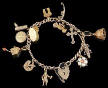 A Continental yellow metal charm bracelet
