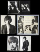 An original early black and white Rolling Stones poster with blue border