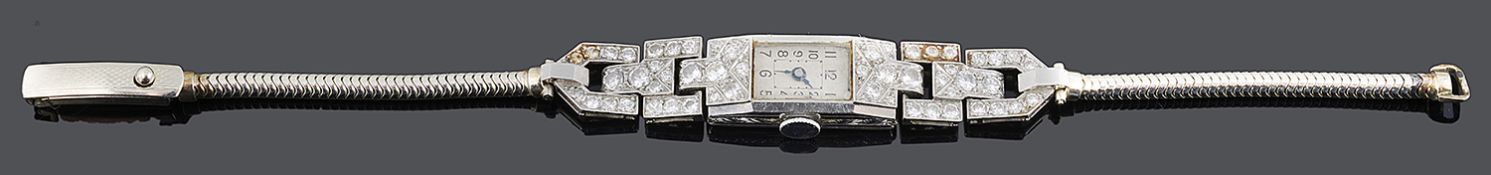 An Art deco platinum and diamond set ladies cocktail watch