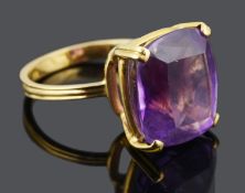 A large Continental single stone amethyst set dress ring