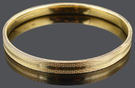 A 1920's 9ct gold slave bangle,