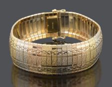 A Continental three colour 18ct gold bracelet