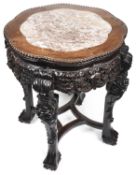 A late 19th c. Chinese export rosewood circular occasional table