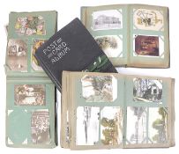 Four Edwardian postcard and greeting card albums