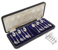 A George V suite of silver teaspoons and sugar tongs, Sheffield 1922/23 by James Dixon & Sons Ltd
