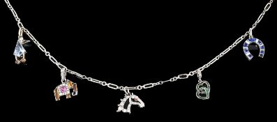 An amusing Art Deco Cartier and other diamond and gem set charm necklace