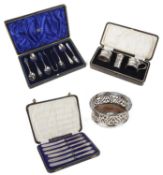 A collection of Edwardian and later silver, teaspoons and sugar nips, others