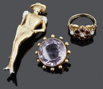 A Victorian gold mounted collet set circular amethyst brooch