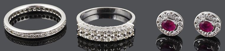 A pair of ruby and diamond set cluster ear studs